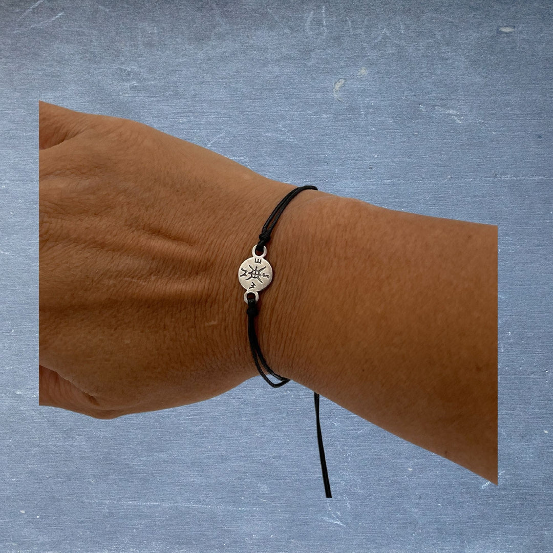 compass bracelet on wrist
