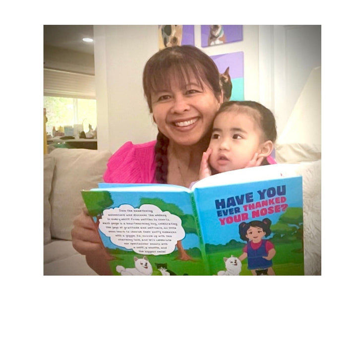 Author Jacqui Letran and main character Bean Bean reading the Have You Ever Thanked Your Nose book
