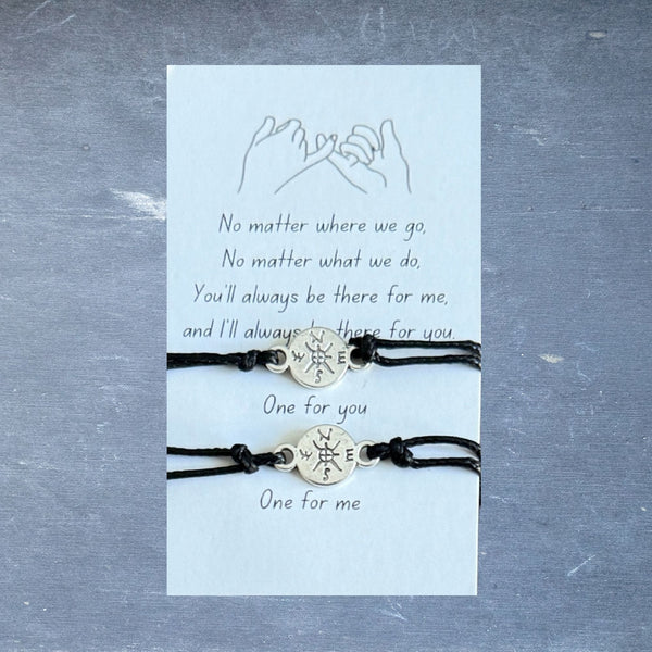 two compass bracelets